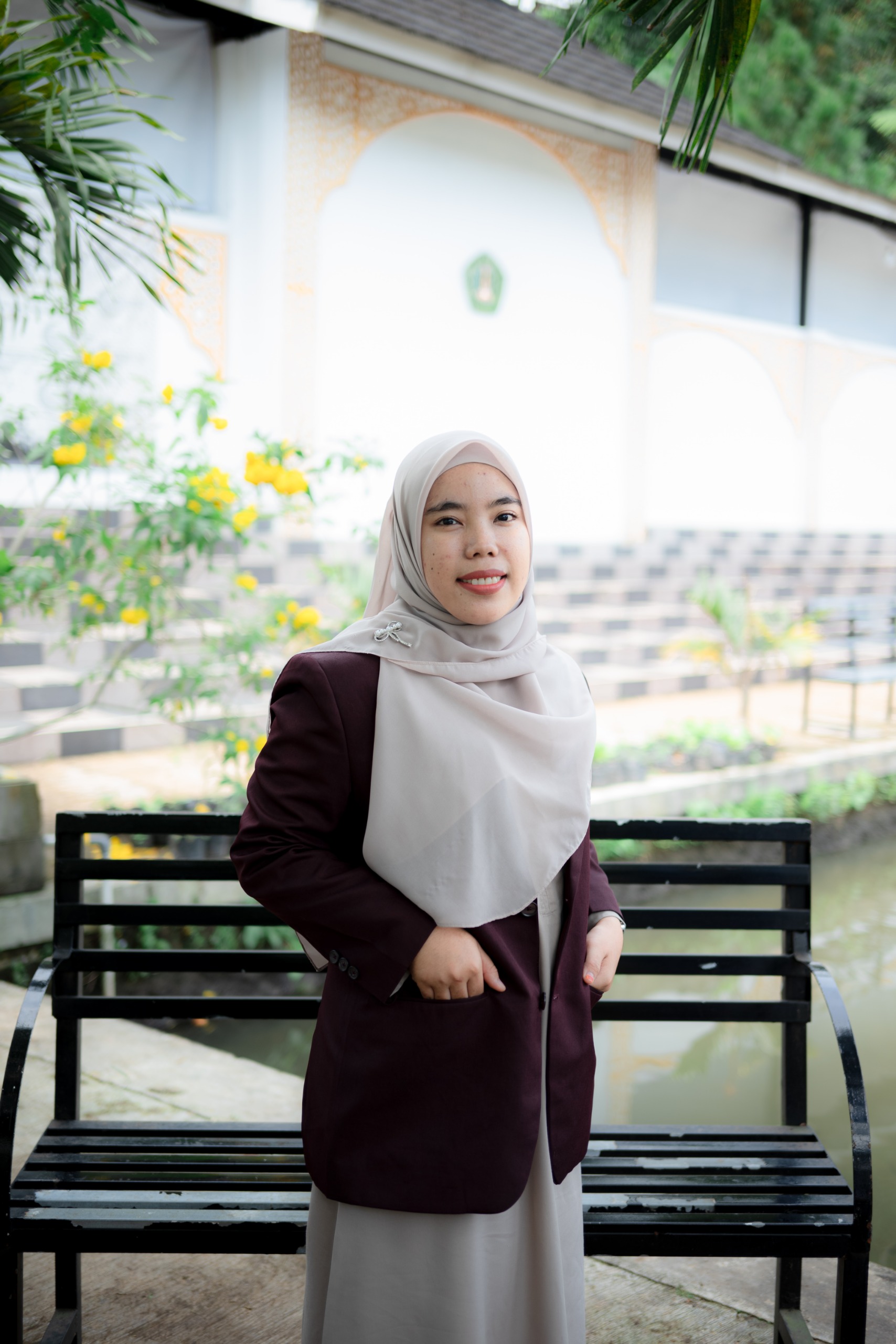 Athia Qorry Aina, S.Sos.